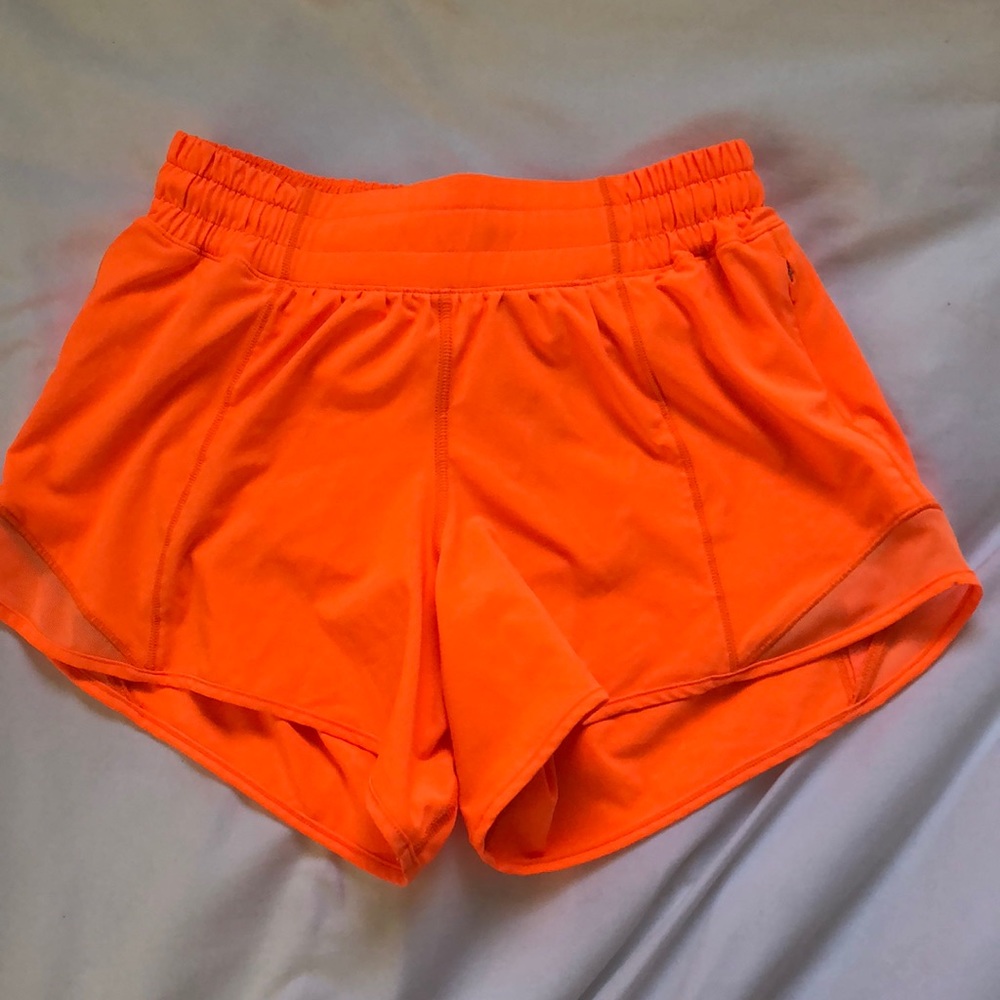 lululemon Hotty hot highlight orange size 4, 4 inch